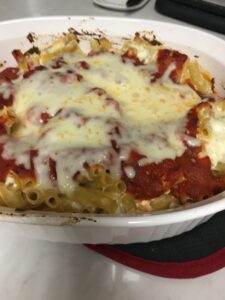 Baked ziti - Add cheese and bake for five minutes Are you ready to try this amazing baked ziti recipe? This easy recipe is a favorite in my house. It fills up my family and there is always leftovers. Enjoy this frugal recipe. #bakedziti #easyrecipes #frugalrecipes