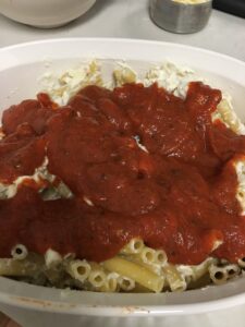 Baked Ziti Recipe - Add sauce Are you ready to try this amazing baked ziti recipe? This easy recipe is a favorite in my house. It fills up my family and there is always leftovers. Enjoy this frugal recipe. #bakedziti #easyrecipes #frugalrecipes